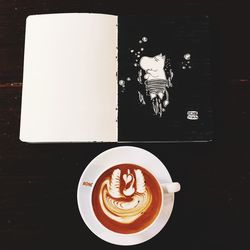 High angle view of coffee cup on table