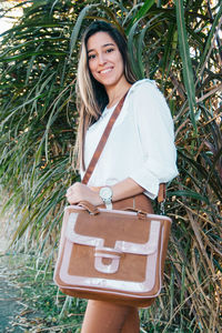 Elegant woman wearing leather bag