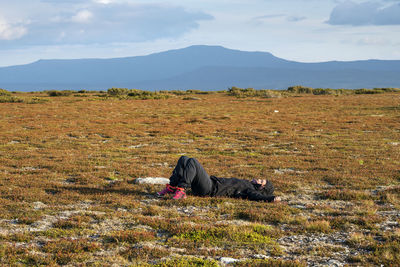 Male hiker resting