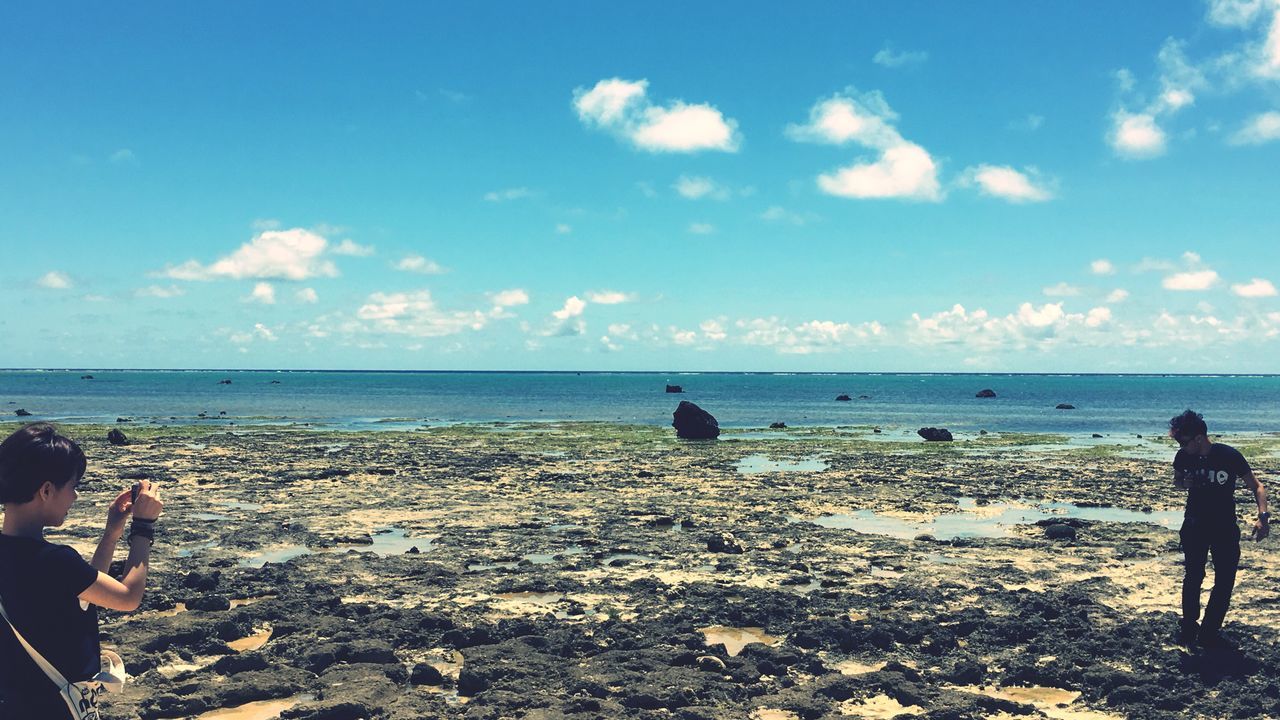 sea, horizon over water, water, sky, lifestyles, shore, leisure activity, scenics, tranquility, beauty in nature, tranquil scene, cloud - sky, nature, vacations, cloud, idyllic, day, outdoors, tourist, coastline, unrecognizable person, remote, tourism, calm