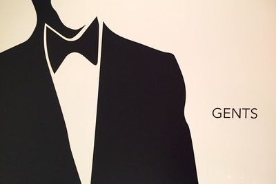 Low angle view of text on wall