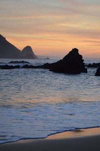 Scenic view of sea against sky during sunset