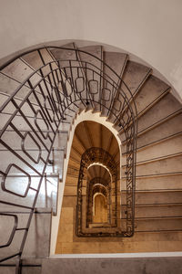 Directly below shot of spiral staircase in building