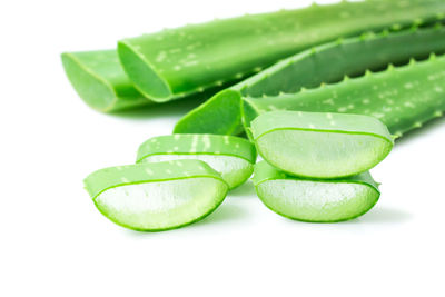 Close-up of green pepper against white background