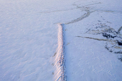 High angle view of snow covered land