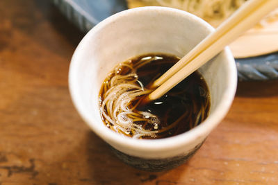 High angle view of coffee cup on table