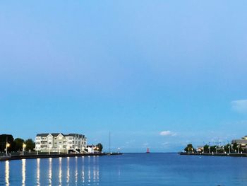 View of city buildings against sky