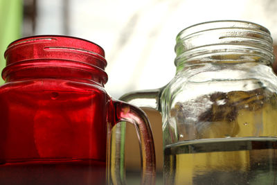 Close-up of glass jar on table