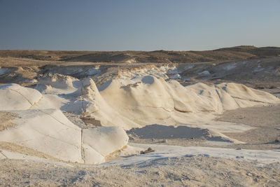 Beautiful lunar landscape. wight and smooth hills. the whitish, smooth chalk rocks. israel.