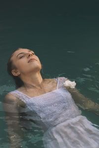 Woman swimming in lake