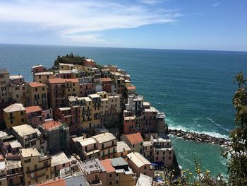 View of townscape against blue sky