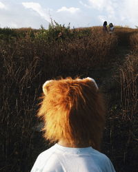 Dog standing on field