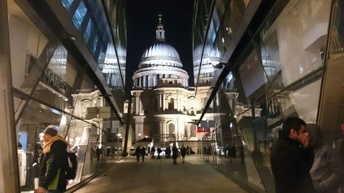 Low angle view of people in front of building