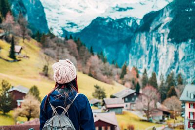 Rear view of woman looking at mountains