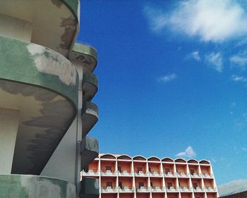 Low angle view of building against blue sky
