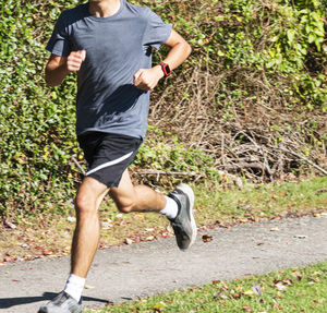 Full length of man running on plant