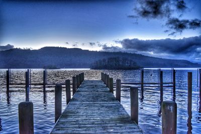 Pier over sea against sky