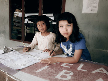 Portrait of a smiling girl looking at camera