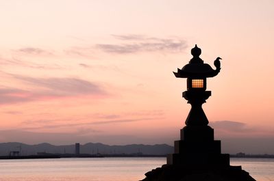 View of calm sea at sunset