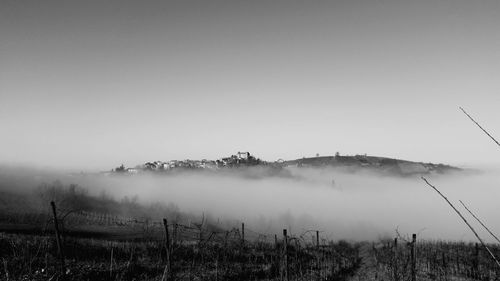 Scenic view of landscape in foggy weather