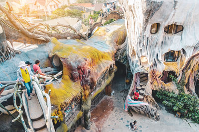 High angle view of multi colored shoes on rock