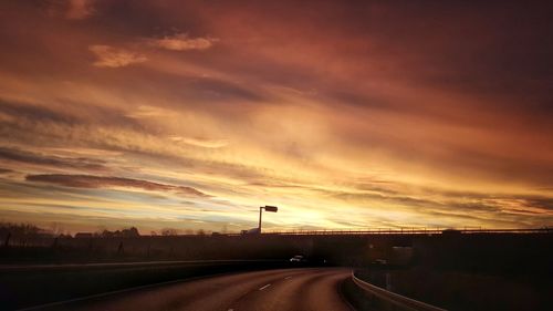 Road against sky during sunset