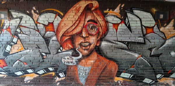 Digital composite image of graffiti on wall