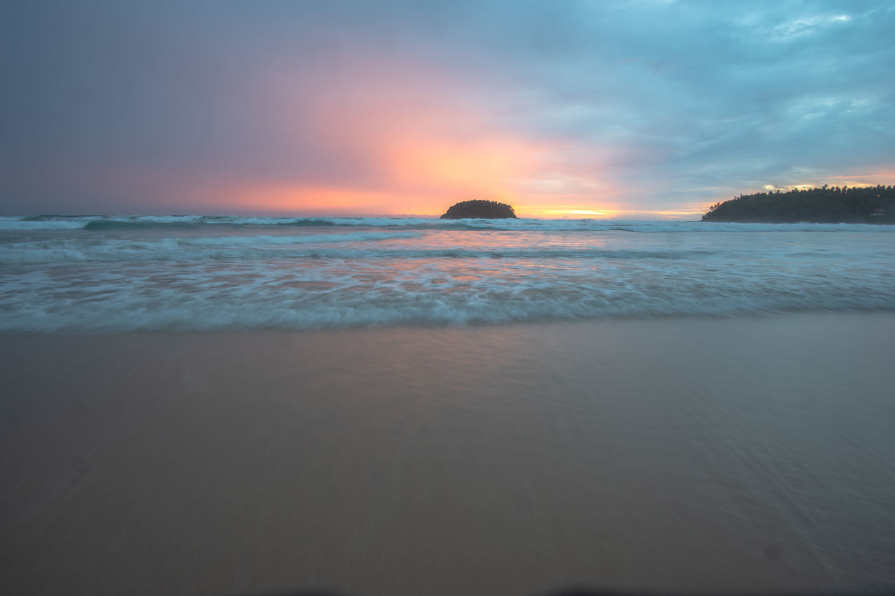 SCENIC VIEW OF SEA DURING SUNSET