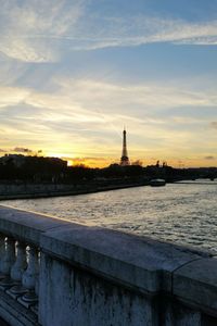 Silhouette of built structure at sunset