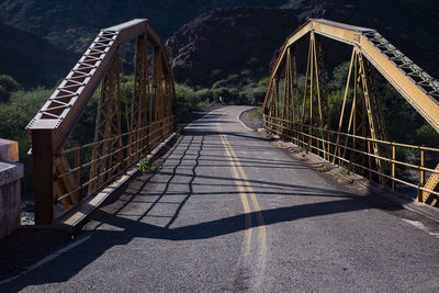 Empty footbridge along road