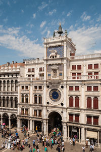 Group of people in front of building