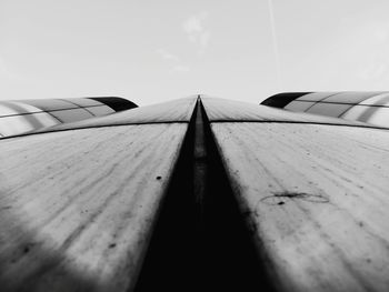 Low angle view of railings against sky