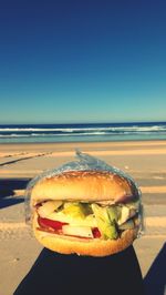 View of burger by sea