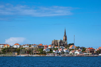 View of buildings in city at waterfront