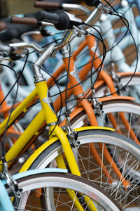 Bicycle outside wet from the rain steering wheel, close up