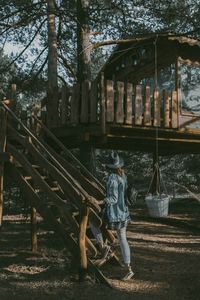 Full length of man on tree