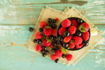 High angle view of strawberries on table
