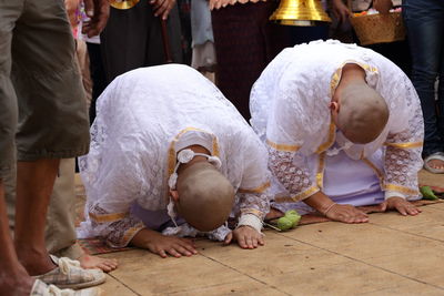 Monks praying during ordination ceremony