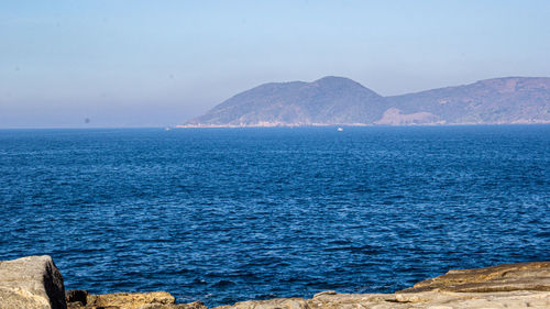 Scenic view of sea against clear sky