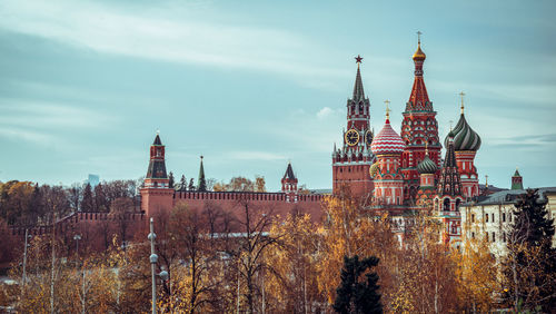 Buildings in city against sky