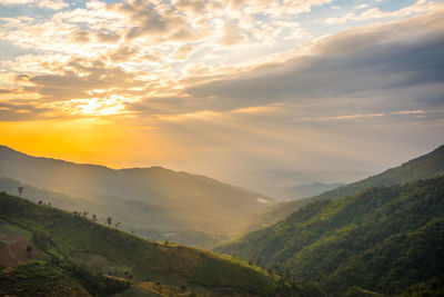 Scenic view of mountains against sky during sunset