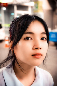 Close-up portrait of young woman