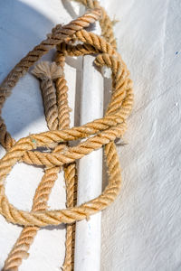 High angle view of rope against wall
