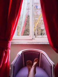 Woman feet in window