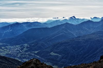 Scenic view of snowcapped mountains against sky