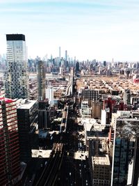 High angle view of buildings in city against sky