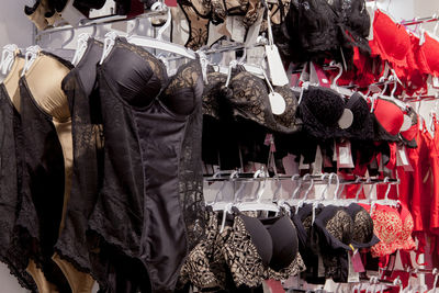 Corsets hanging in store for sale