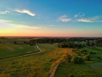 Scenic view of landscape against sky during sunset