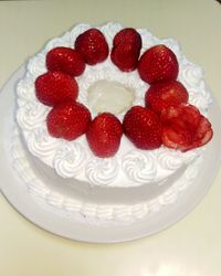 High angle view of strawberries in plate