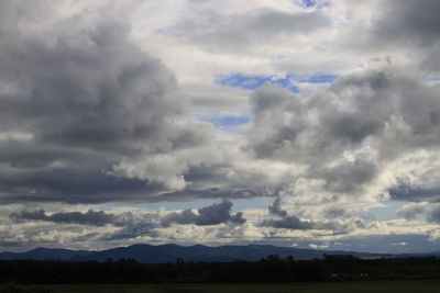 Storm clouds over landscape